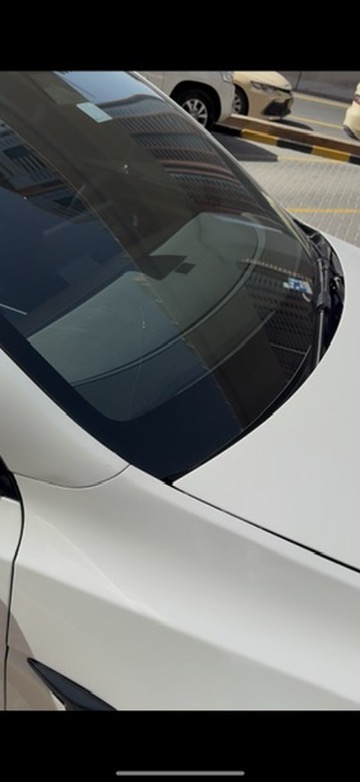 Tesla Model Y Damaged Windshield in Dubai