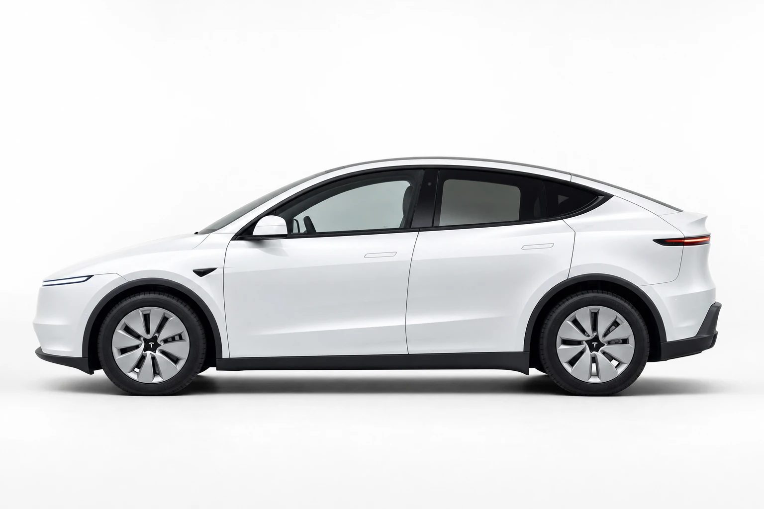 Facelift Tesla Model Y - Pearl White - 19-inch Gemini wheels - side profile view
