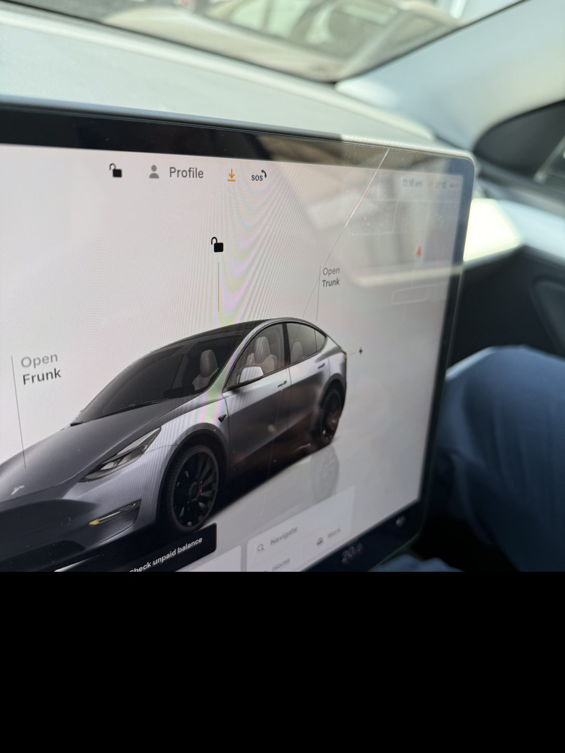 A cracked Tesla center touchscreen found during a pre-purchase inspection
