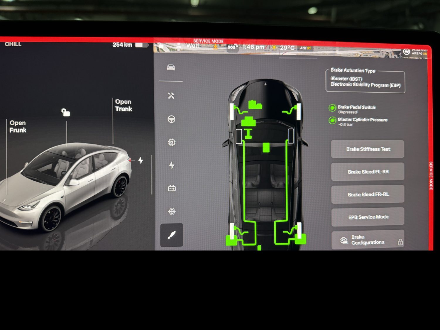 Tesla Service Mode brakes panel covering the booster, parking brake, stability control, and wheel-speed sensors