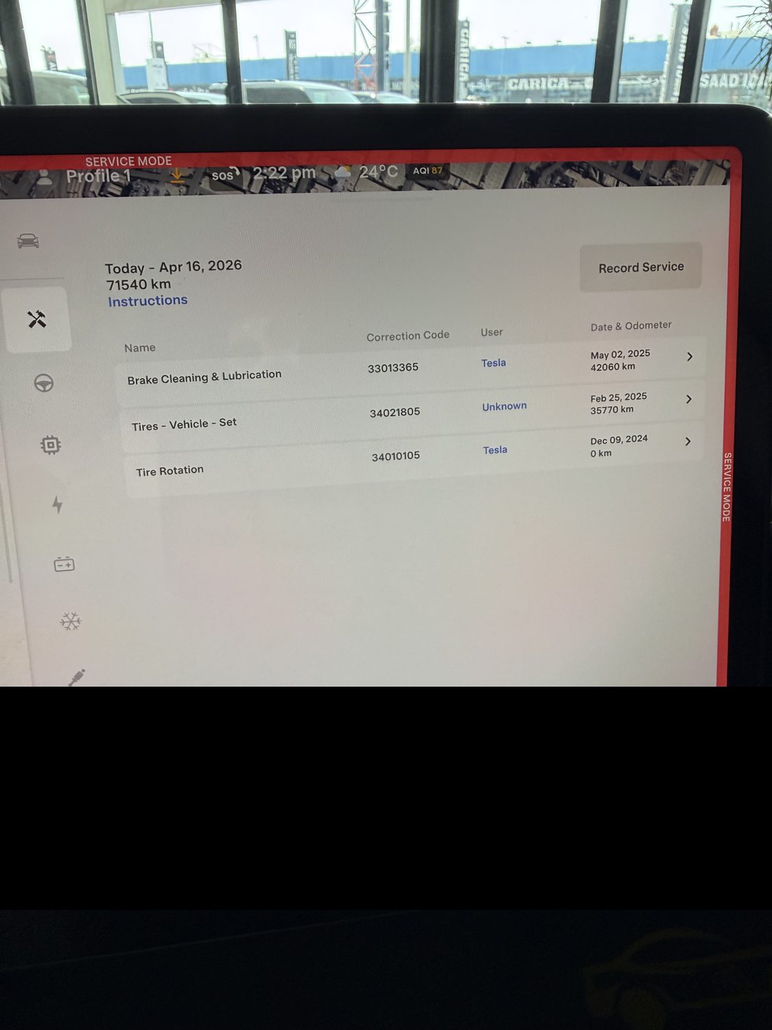 Tesla Service Mode service-history screen with timestamped entries, correction codes, and who logged each