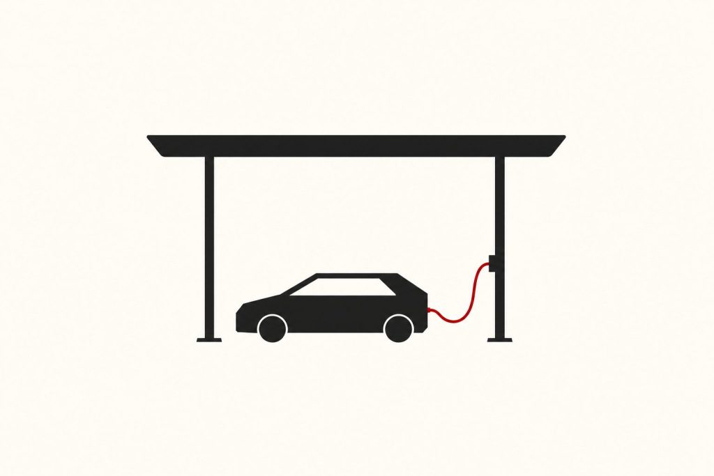 A petrol-station canopy sheltering a car connected to a red charging cable